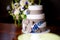 Three stories wedding cake decorated with blue flowers