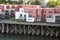 Three-story apartments on wooden stilts on the banks of the Willamette River in Portland