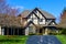 Three Story House with Blacktop Driveway