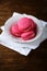 Three strawberry delicious macaroon in a plate