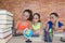 Three Student, Young Girl working on his homework. Portrait of girls high school student studying and writing