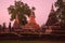 Three stupas on the ruins of the Buddhist temple Wat Mahathat. Sukhothai. Thailand