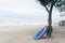 Three Surfing Board Under The Tree in Seminyak Beach Kuta Bali