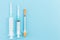 Three syringes on medical blue copyspace