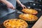 Three tasty pies cooked by cheif cook on the kitchen