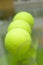 Three tennis balls