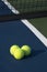 Three Tennis Balls Casting a Morning Shadow 2