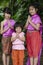 Three thai Girls pose welcome Sawasdee