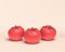 Three tomatos side by side with flat solid red color in white background, 3d Icon, 3D rendering, vegetable