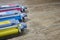 Three toner cartridges for color laser printer stacked on wooden table