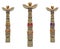 Three totem poles isolated on white background