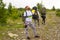 Three tourists with backpacks