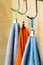 Three towels hanging on a hook