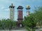 Three towers stand side by side near the Melaka Gateway Arch in Melaca, Malaysia to represent the three major races in the country