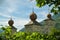 Three towers of Stockalper castle hidden behind the trees in Brig, Switzerland