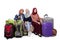 Three traveler veiled woman holding suitcase jokingly sitting on the couch