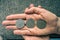 Three Tunisian coins on the woman\'s palm