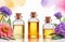 three unbranded essence oil bottles on floral watercolor background, beauty herbal product