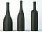 Three uncorked black bottles for wine or beverages