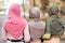 Three Unrecognizable Muslim Ladies In Hijab Walking Outdoor