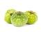 Three unripe organic heirloom Beefsteak tomatoes isolated on white