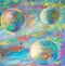 Three variegated planets in multicolored space