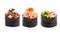 Three varieties of gunkan on a white background. Japanese seafood sushi roll. Isolated