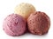Three various ice cream balls - strawberry, vanilla and chocolate