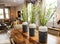 Three Vases As Centerpieces On Wooden Table