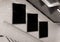 Three vertical billboards on underground stairs wall Mockup. Triptych hoardings advertising in white tiles tunnel interior. 3D