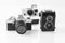 Three vintage analogue cameras