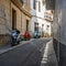 Three Vivid scooters parked up a charming little alley in Spain.