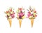 Three waffle cones with flowers on white background