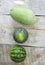 three watermelons on the wooden boards