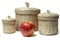 Three wattled baskets and apple isolated