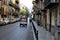 Three-wheeled scooter for tourists in transit in a street of Palermo, Italy