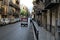 Three-wheeled scooter for tourists in transit in a street of Palermo, Italy