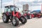Three wheeled tractors at an agricultural fair