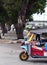 Three-wheels open air, fun and well known BANGKOK and THAI urban TUK-TUK taxi