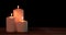 Three white Christmas candles burning on table