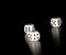 Three white dice on old wood black table with space for text