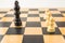 Three white pawns against black king