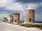 The three Windmills of Mandraki Harbour in Rhodes Greece.