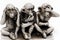 Three wise monkeys small figurine isolated