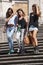 Three woman down spanish steps