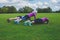 Three women doing push ups in park