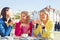 Three women having a fun conversation