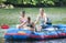 Three women in a raft floating down the Clackamas River