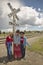 Three women at a railroad crossing dressed for the Fourth of July,in Lima Montana