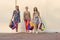 Three Women with Shopping Bags on walk